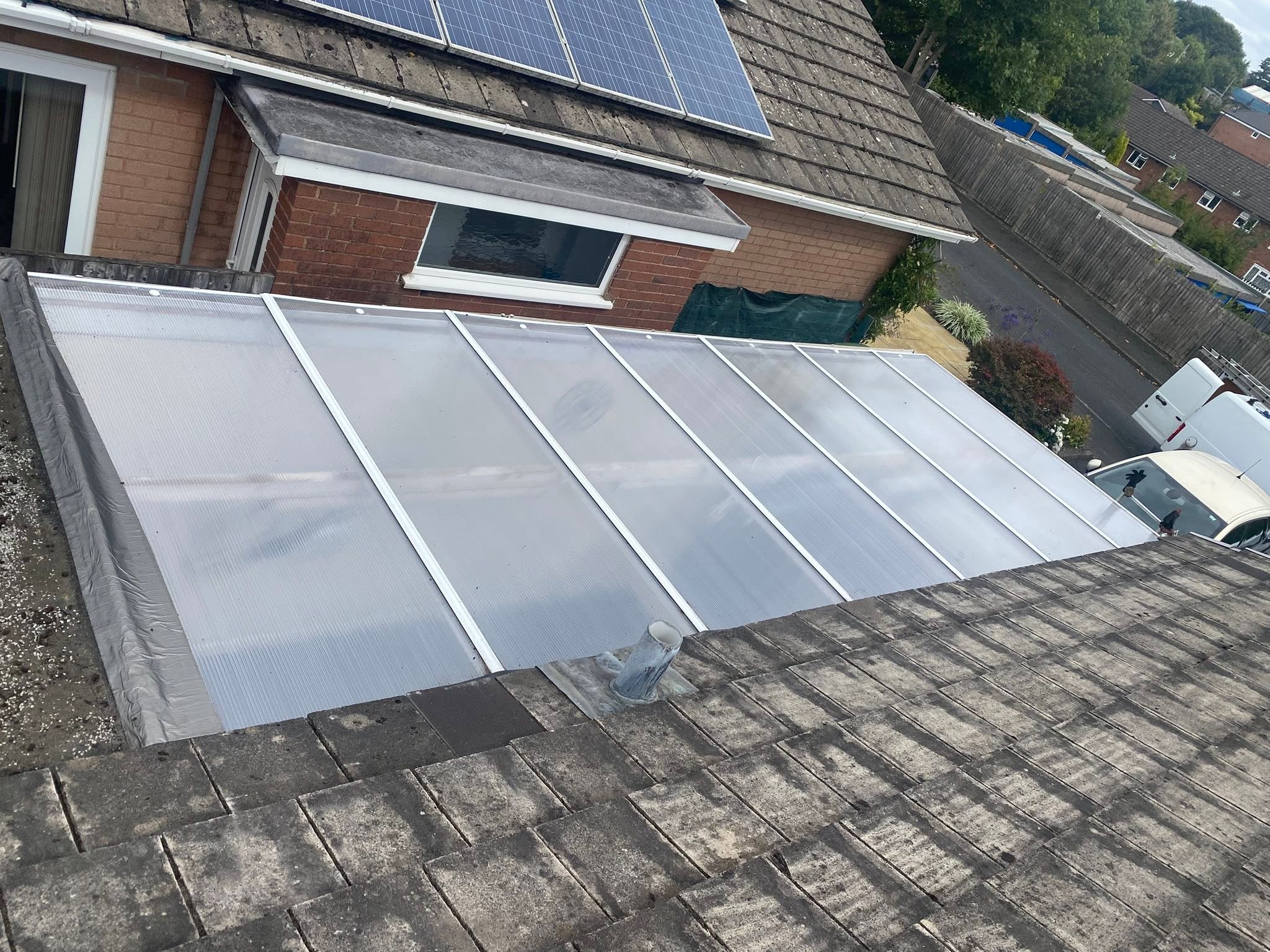Polycarbonate conservatory roof panel replacement viewed from above — LDF roofline services, West Midlands